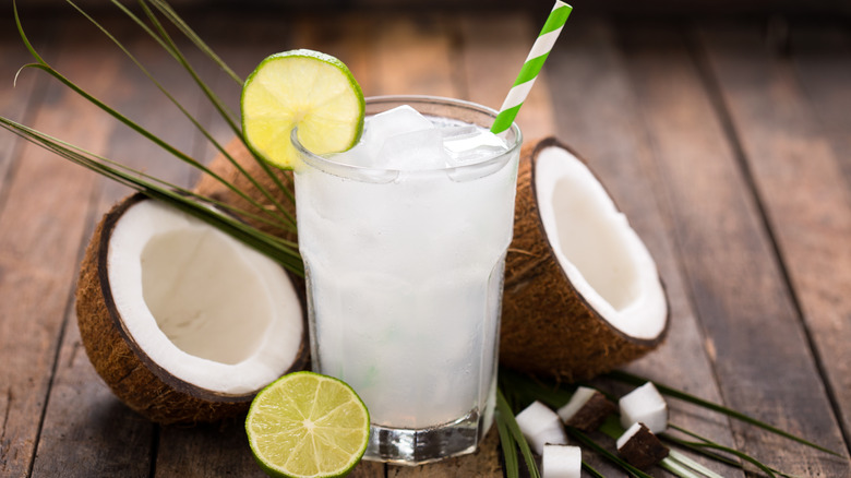 Decorative glass of coconut water