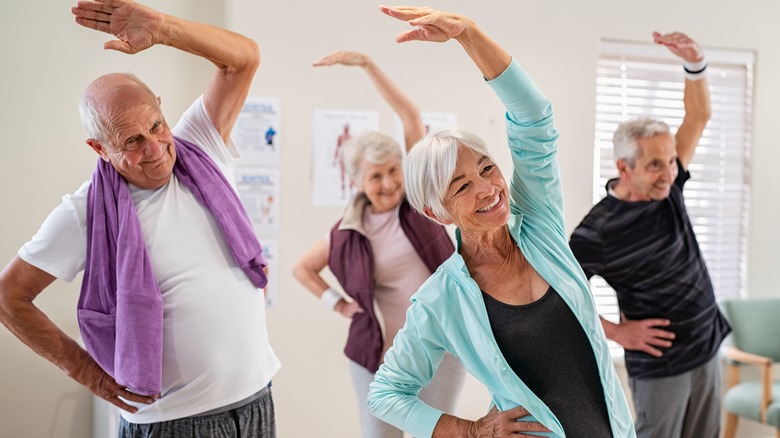 group of seniors in yoga class