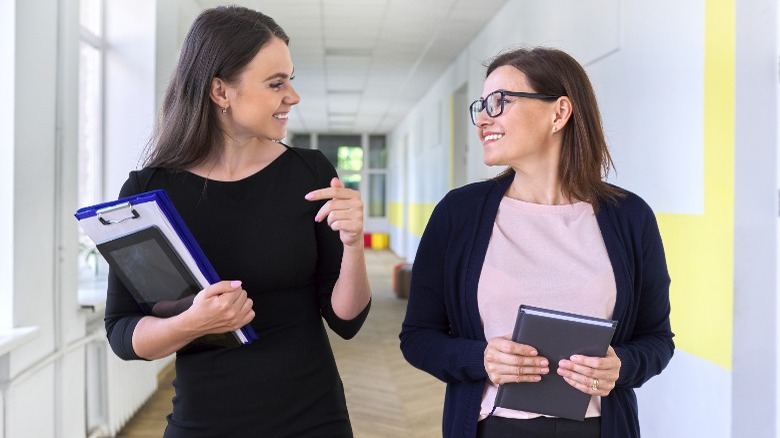 women walking in office