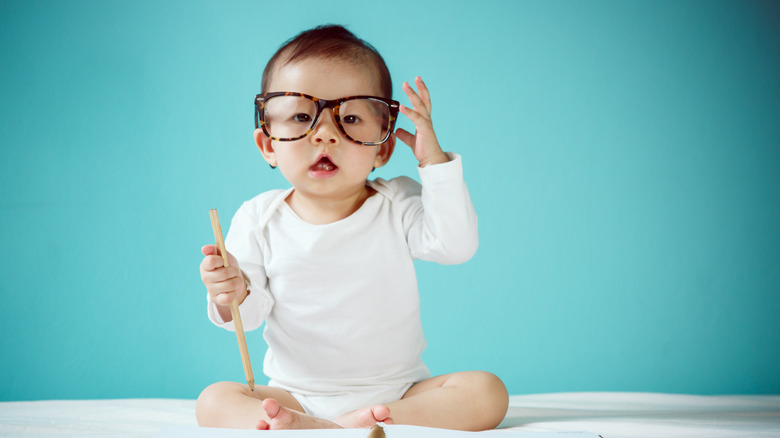 Baby wearing eyeglasses