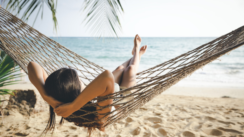 woman in hammock on beach