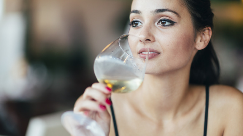 woman drinking wine