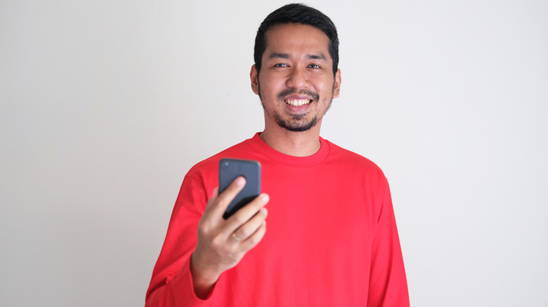 man wearing red shirt