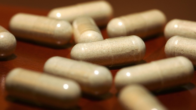 Close-up of diet pill capsules