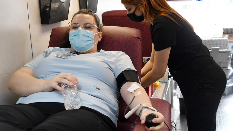 Woman donating blood