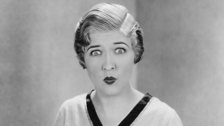 Woman looking surprised, 1920s