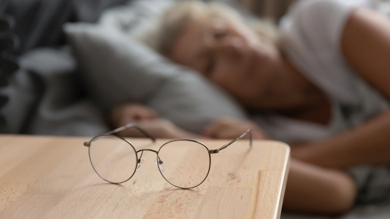 woman sleeping glasses