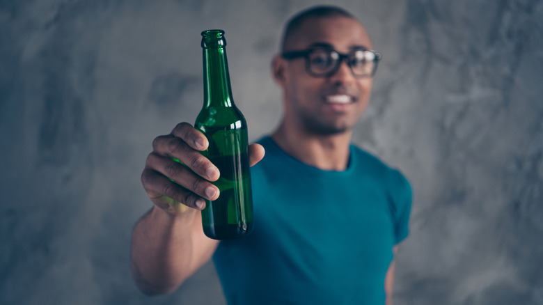 guy with beer bottle