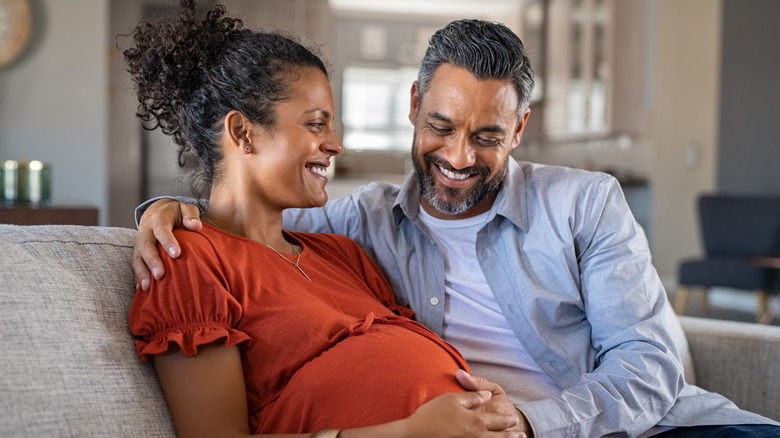 pregnant and happy couple