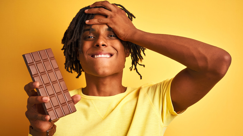 man holding chocolate 