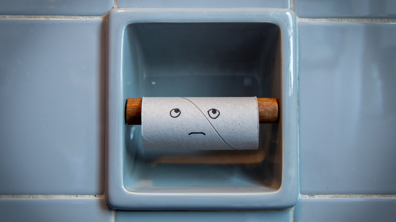 sad face on toilet paper roll