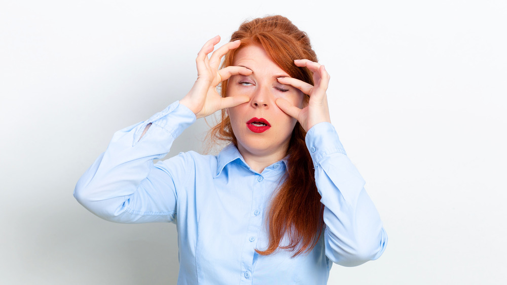 Redhead woman making a face