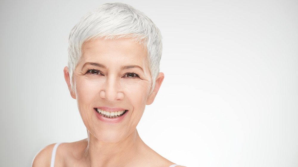 gray-haired woman smiling