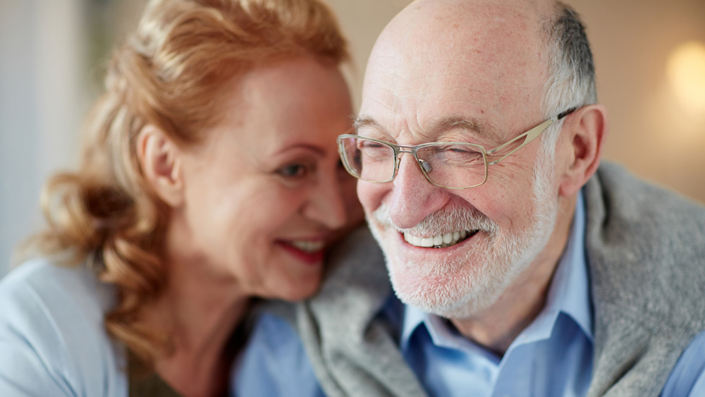 Smiling Senior Couple on Couch