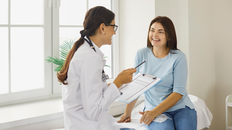 Woman talking to her physician