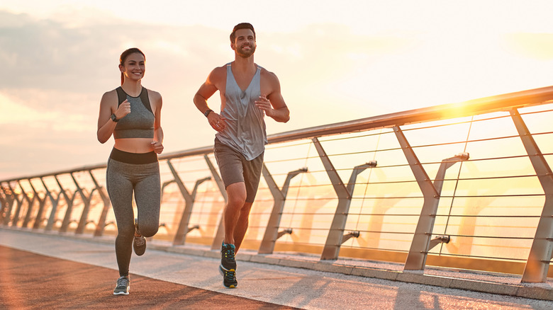 two people running