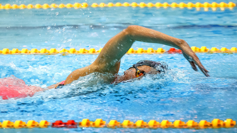 woman freestyle swim stroke