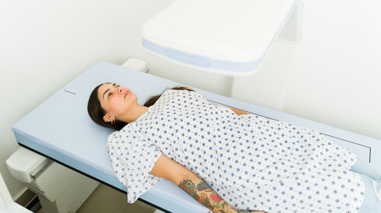 young woman having bone density scan