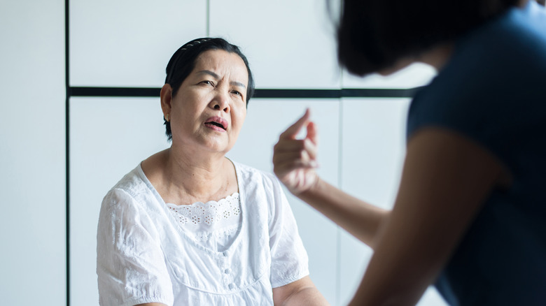 Woman having trouble understanding words