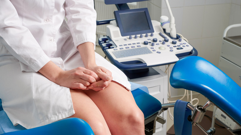 Woman sitting in a gynecologist's office