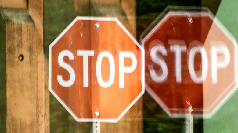 Distorted double image of a stop sign