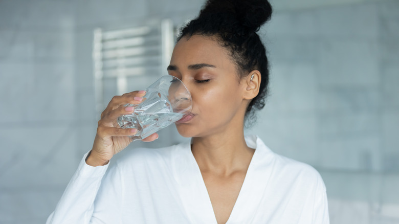 Woman drinking a glass of water