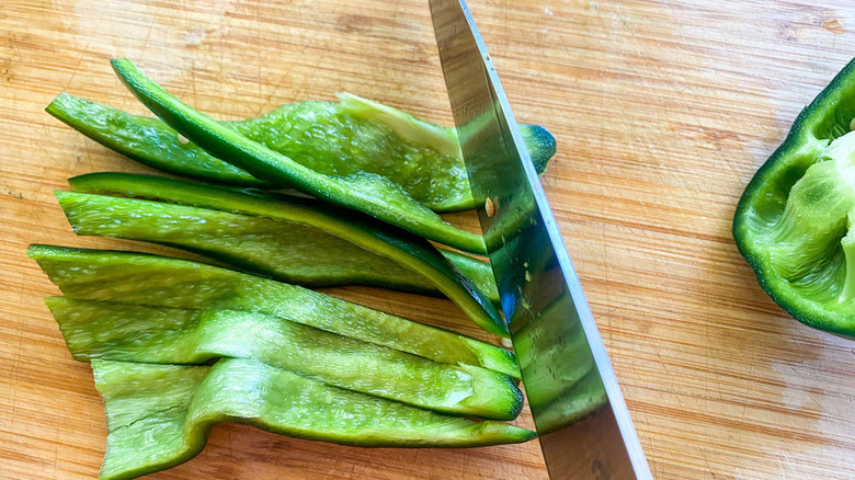 green pepper on chopping block