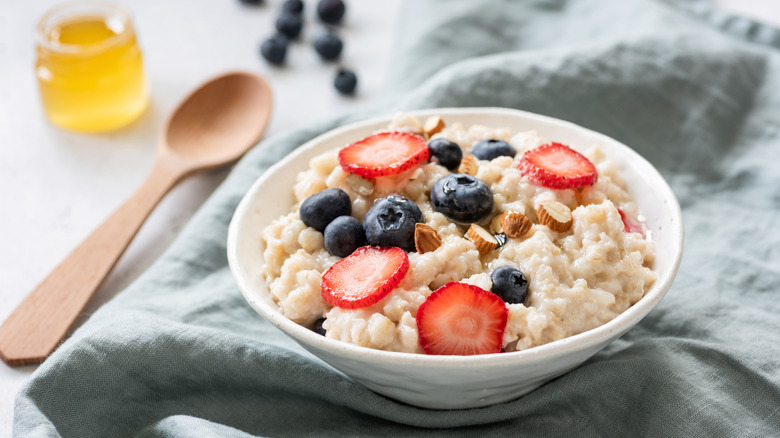 Bowl of oatmeal topped with berries