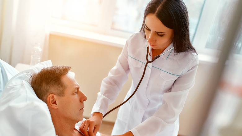 Doctor examining a patient in the hospital