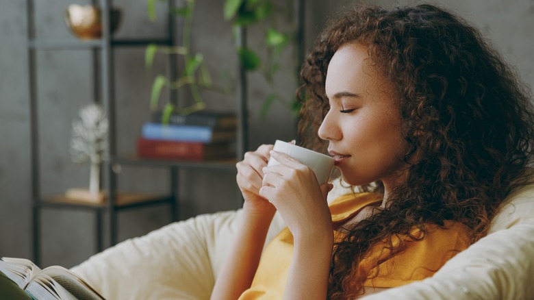 Woman savoring a cup of coffee