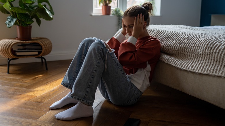 girl sitting on floor