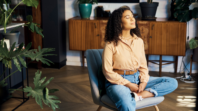 woman sitting on chair