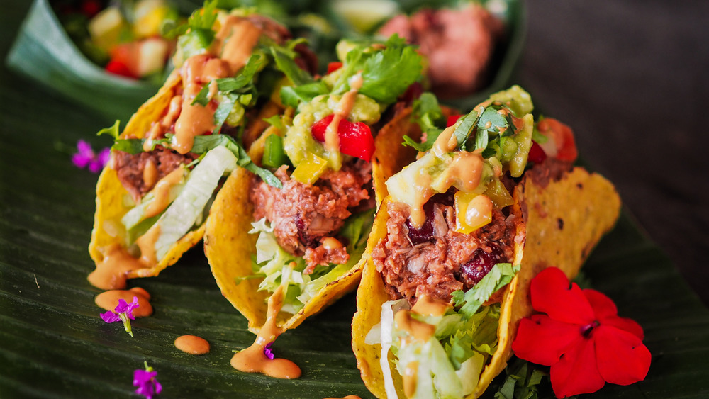 Vegan jackfruit tacos on a platter