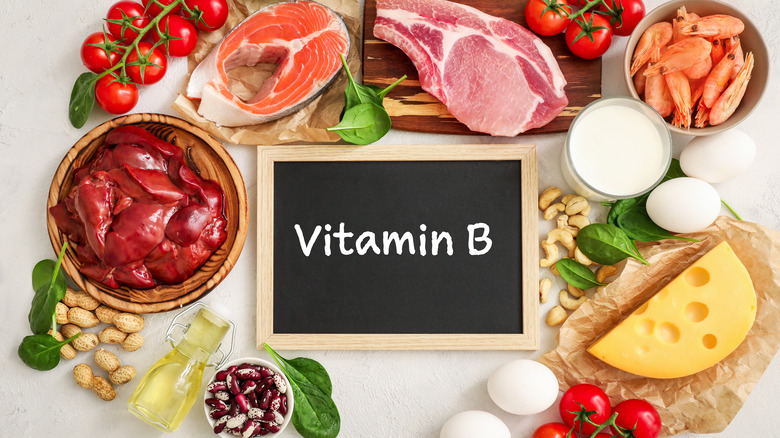 Vitamin B sign surrounded by food