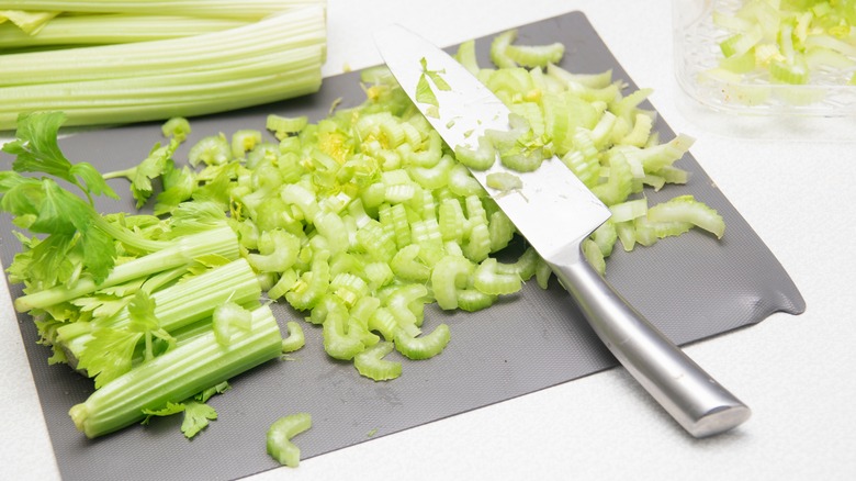 celery chopped up on board