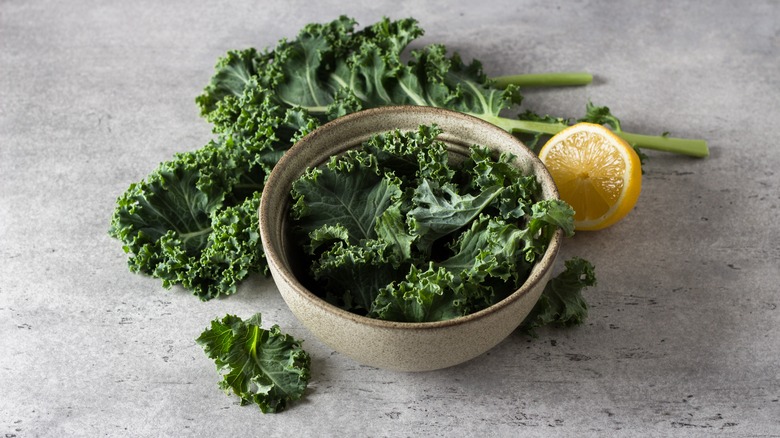 kale in bowl with lemon