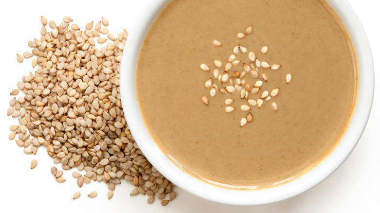 tahini in ramekin with sesame seeds