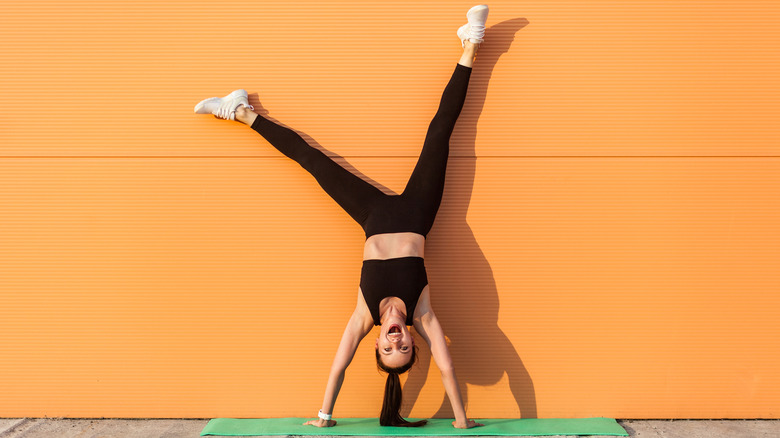 happy handstand girl