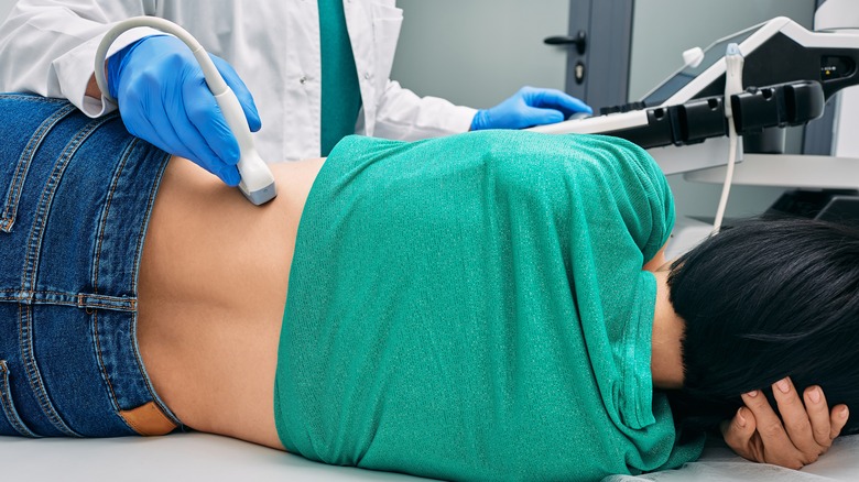 woman getting ultrasound on her kidney