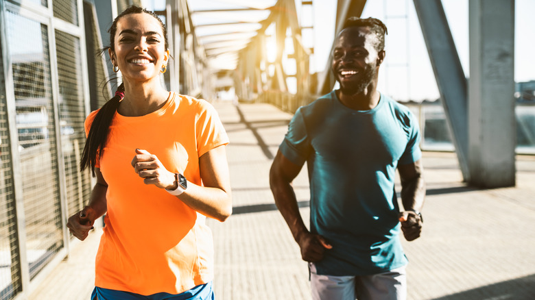 A couple goes jogging