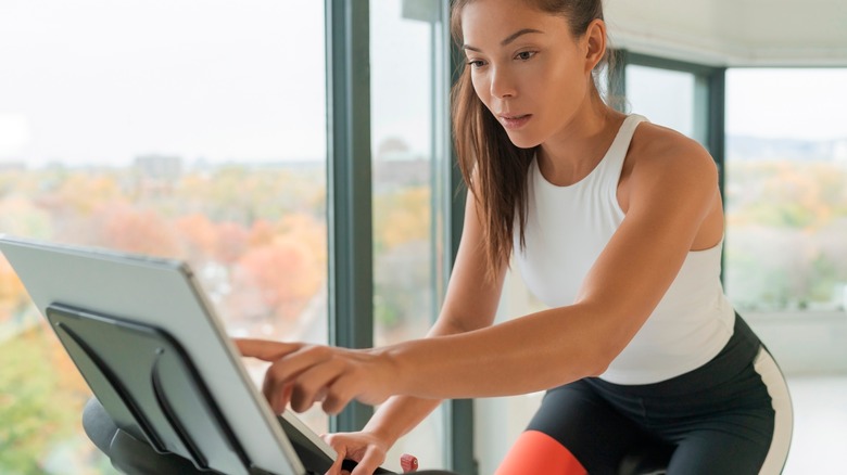 woman on exercise bike