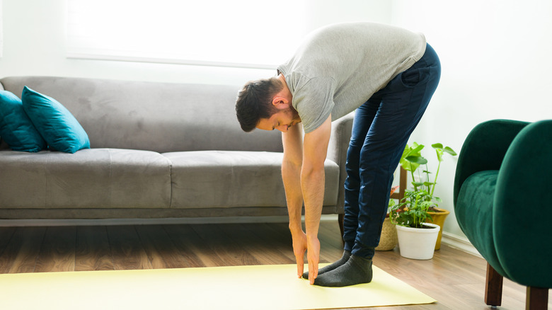 standing forward bend yoga pose