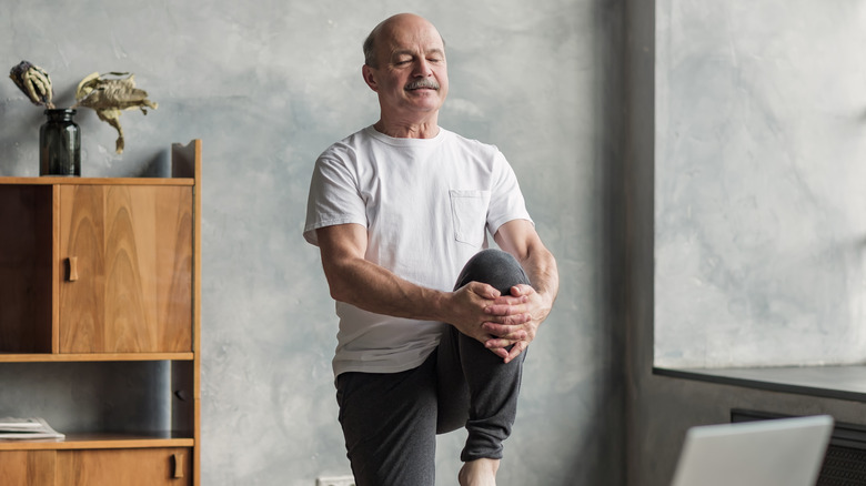 Man performing balance exercise