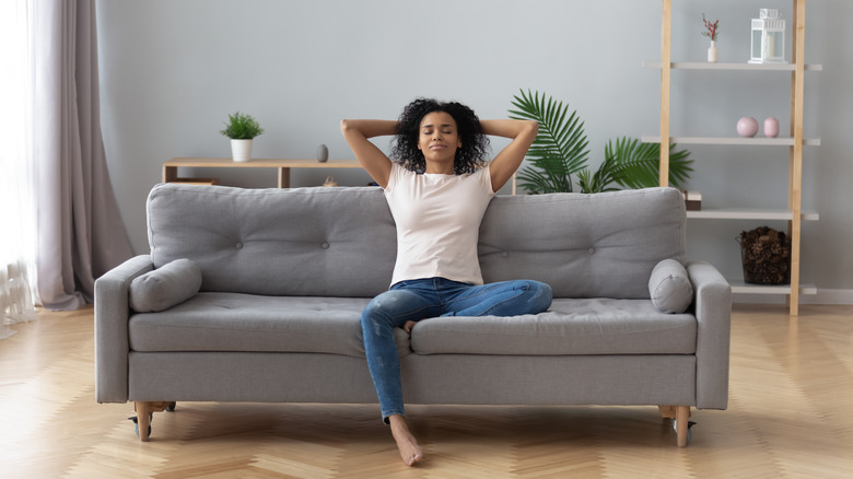 resting woman on couch