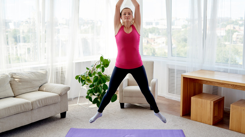 woman doing jumping jack