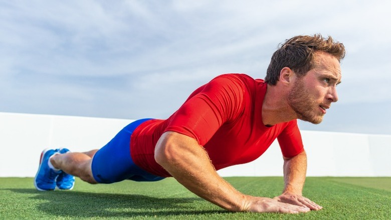 Man doing diamond pushups