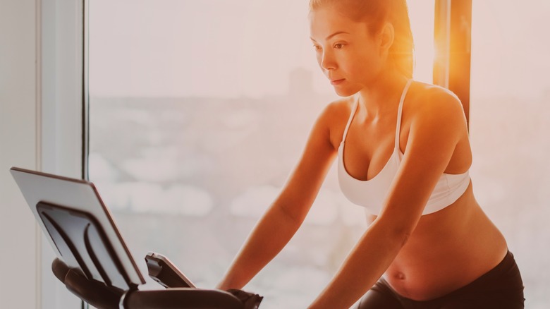 pregnant woman on exercise bike