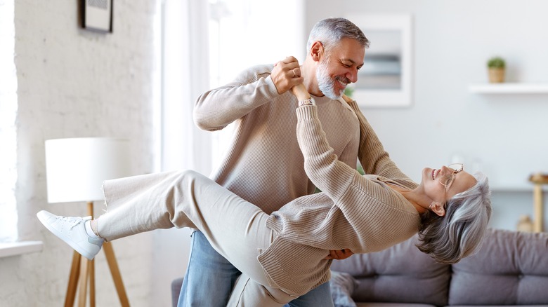 couple dancing at home