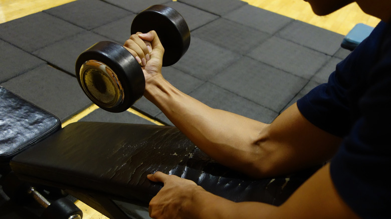 person doing wrist curls