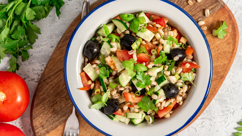 salad with barley in bowl